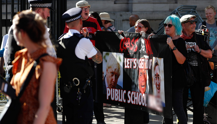 'Not my prime minister!': Anti-Boris Johnson protesters rally in London