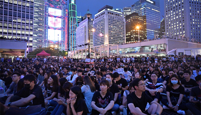 Thousands of Hong Kong civil servants defy government to join protests