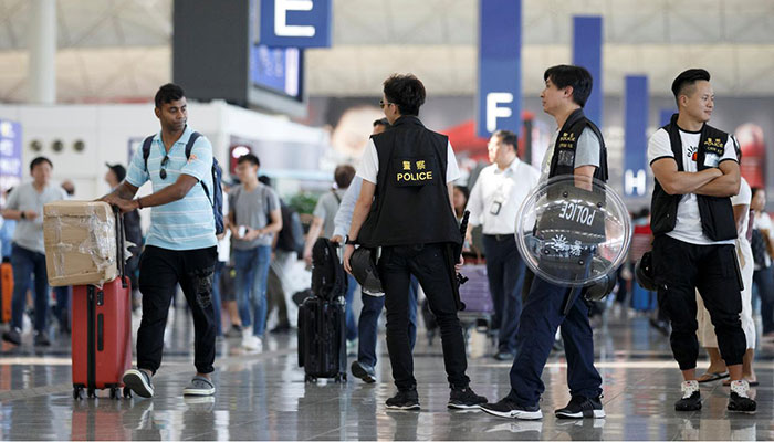 Hong Kong readies for more protests, Trump ties crisis to US-China trade deal