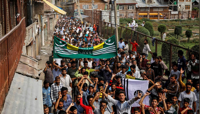 Besieged occupied Kashmir neighbourhood in test of wills with India's Modi