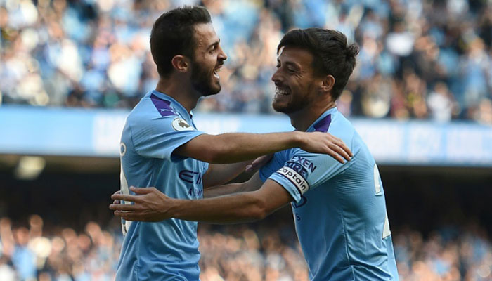 Man City hit eight in Watford demolition, Spurs rocked by Leicester