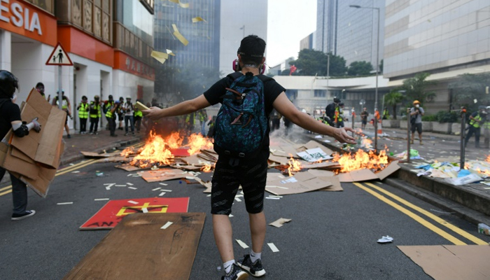 Hong Kong police shoot protester on China's 70th birthday