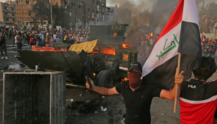 Thousands in bloody protests across Iraq, 31 dead