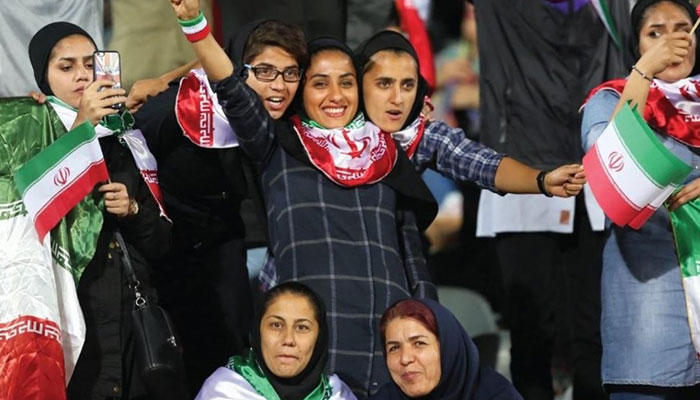 Iran women allowed into football stadium for first time in decades