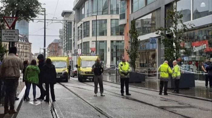 Four stabbed in Manchester as Police arrest a 40-year-old suspect Four stabbed in Manchester as Police arrest a 40-year-old suspect