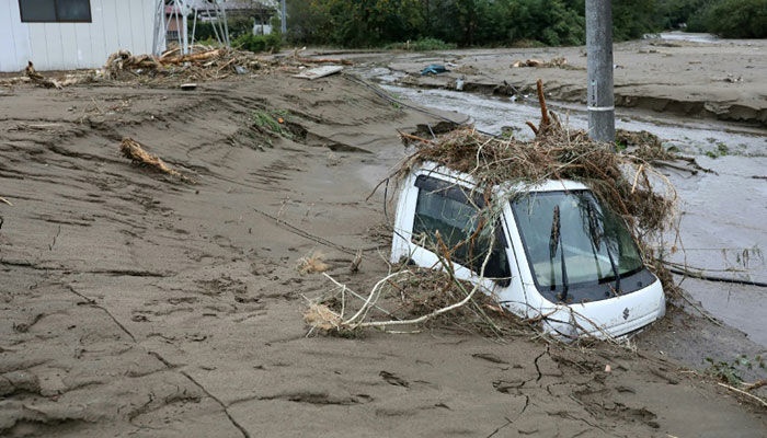 Clean-up, rescue efforts in Japan as typhoon toll nears 70