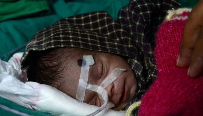 'Miracle survival' for newborn Indian girl found in grave three days after being buried alive
