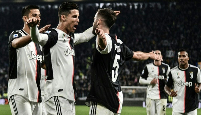 Ronaldo smashes 701st goal as Juventus reach top spot in Serie A