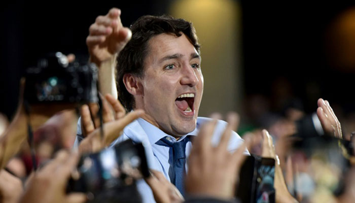 Canada vote too close to call as Trudeau hopes to cling on