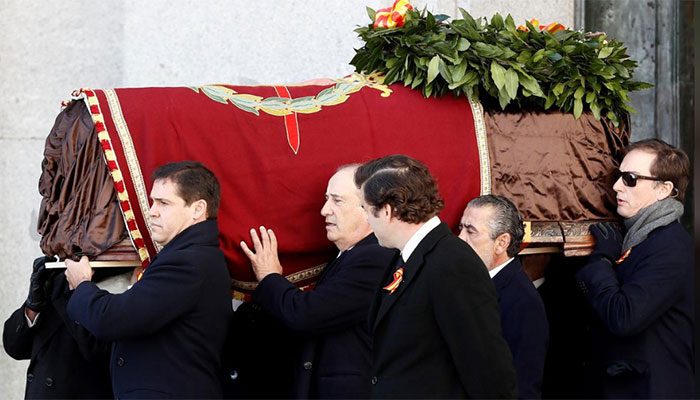 Confronting its troubled past, Spain exhumes Franco
