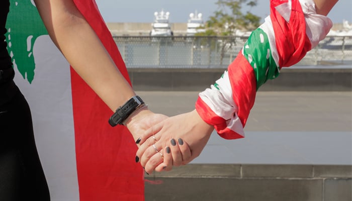 Lebanon protesters start forming nationwide human chain