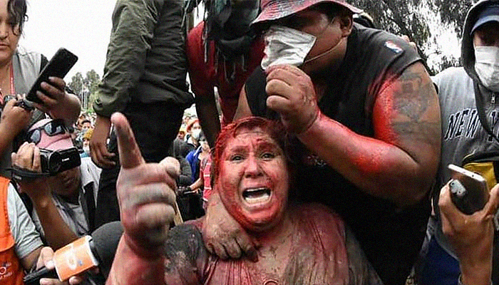 Bolivian protesters drag town mayor barefoot in streets, forcefully cut her hair