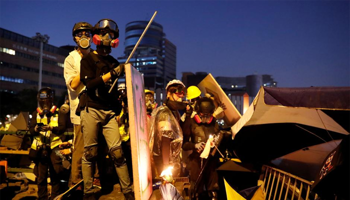 Hong Kong campus protesters fire arrows as unrest spreads across Kowloon