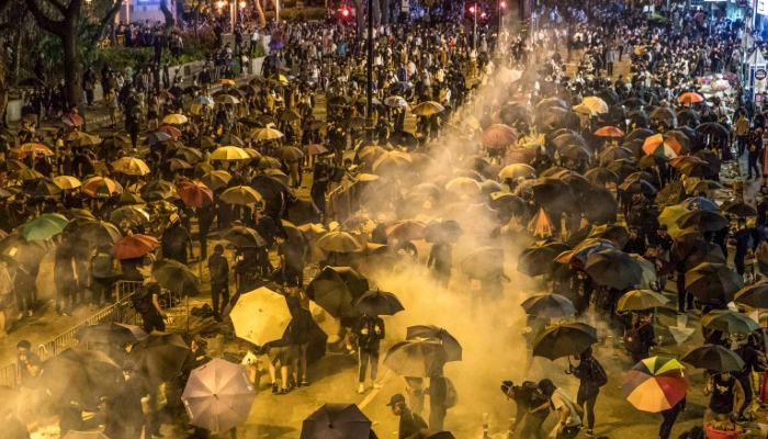 Hong Kong university protesters defy surrender warnings