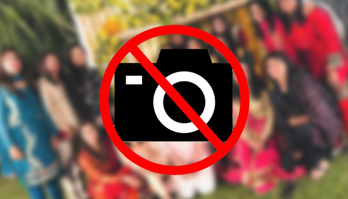 Guests throw hands over taking pictures of women in Peshawar wedding
