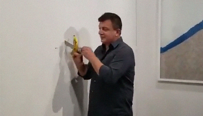 Man eats $120,000 piece of art — a banana taped to wall