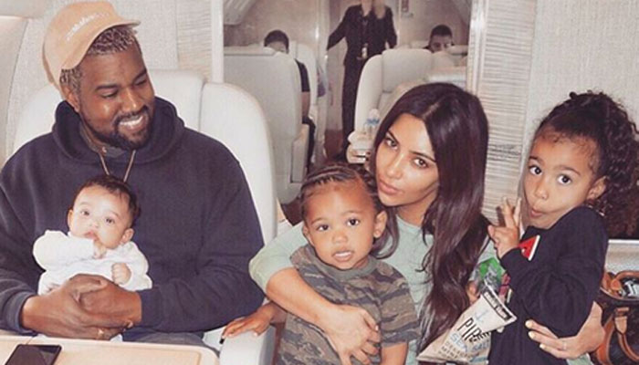 Kim Kardashian criticized for photoshopping kids in Christmas card