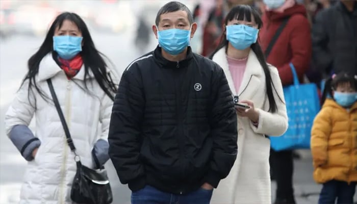 Chinese health official confirms new virus 'not as powerful as SARS'