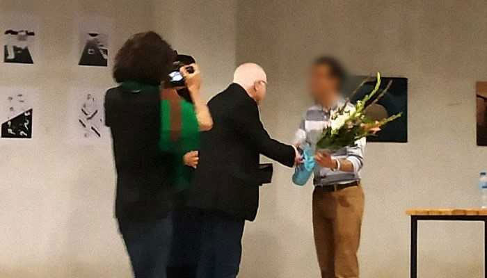 Layla is presented with an honourary shield after the Gender Identity and Expression session at a private university in Karachi. Geo.tv/via Author