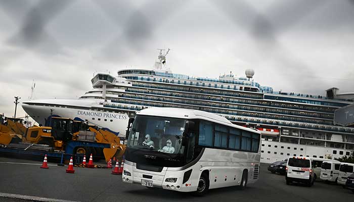 Japan allows some elderly passengers to leave quarantined ship