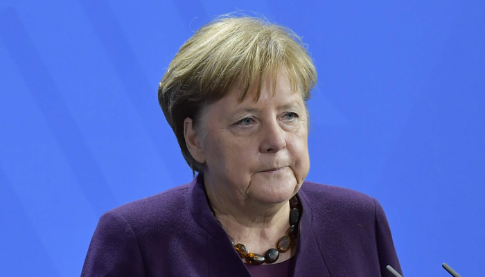 Racism, hatred 'a poison' in society, says Merkel after German mass shootings
