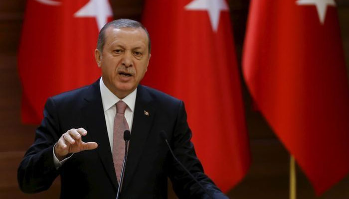 Erdogan vows to keep border open, asks Europe to share migrant 'burden'