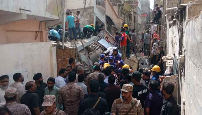Death toll from Karachi buildings collapse rises to 18