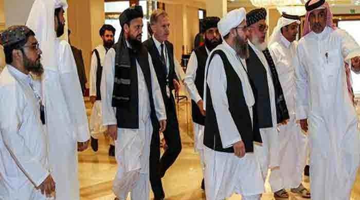 Afghan Taliban vow to abide by peace deal after series of attacks