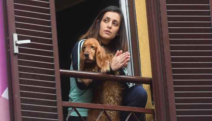 Italians sing out from balconies during coronavirus lockdown