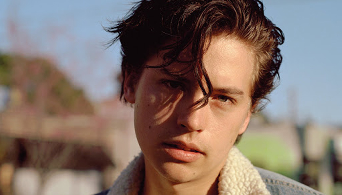 Cole Sprouse feels happy he didn’t miss the high school experience