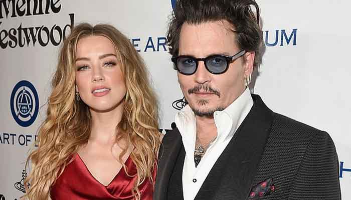 New tape shows Amber Heard cozying up to Elon Musk in Johnny Depp's penthouse elevator 