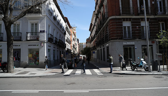 Spain toughens restrictions as coronavirus death toll surges