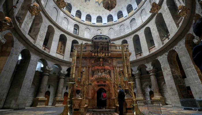 Christians celebrate Easter Friday behind closed doors in Jerusalem due to fear of virus spread