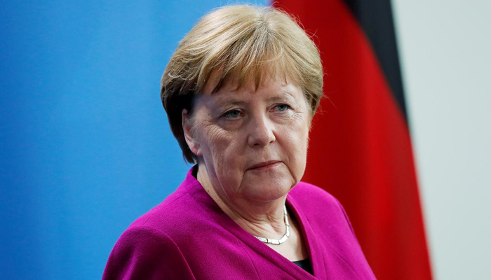 Angela Merkel warns Germany not 'out of the woods'