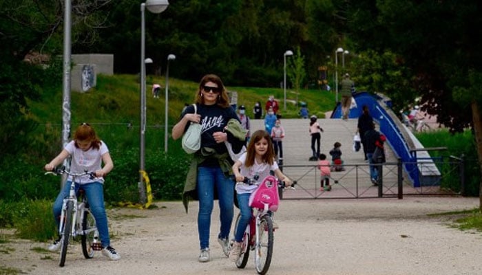 Spaniards come out of houses as strict lockdown eases further 