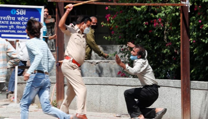 Chaos outside liquor stores as India eases virus lockdown