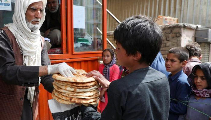 Two cops among six killed in clash at Afghanistan food distribution event