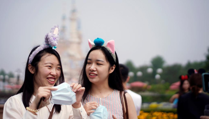 Paris salons, Shanghai Disney reopen despite global alarm over second wave
