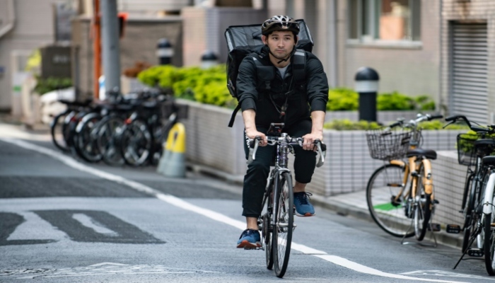 Japan's Olympic fencer turns to food delivery to make ends meet