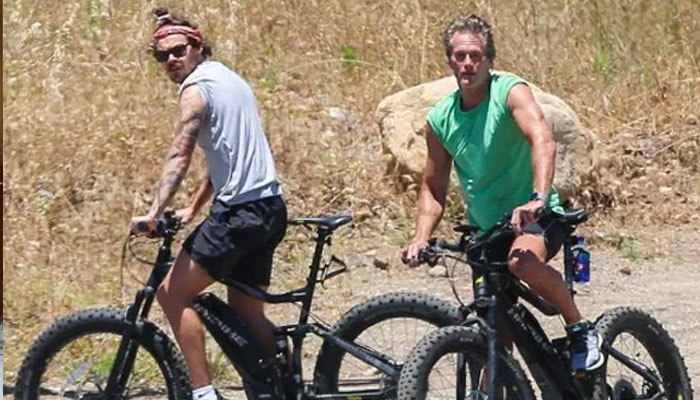 Harry Styles enjoys bike ride with Kaia Gerber’s dad Rande