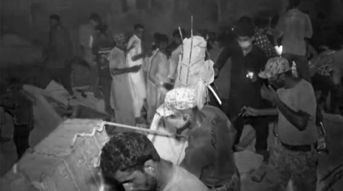Karachi building declared 'dangerous' collapses, killing at least one