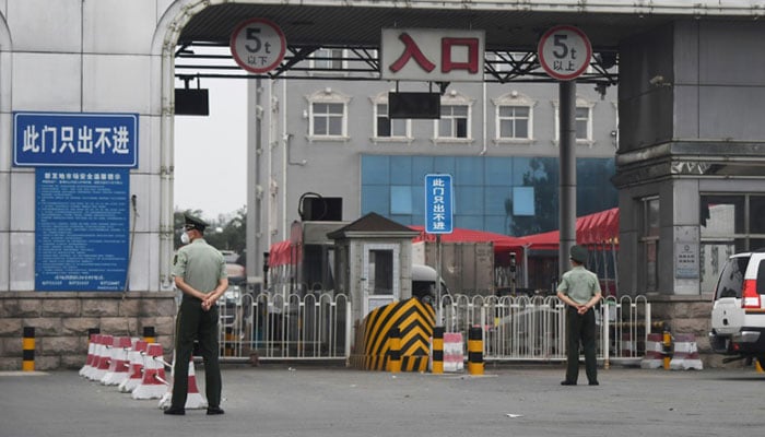 Beijing returns to partial lockdown after 47 new COVID-19 cases