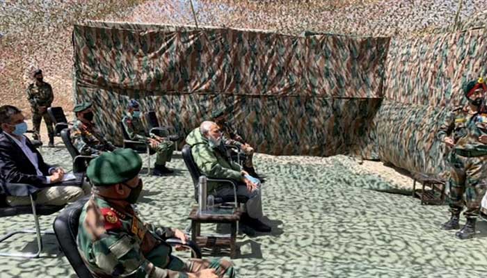 India's Modi rallies troops at China border, as Beijing urges caution
