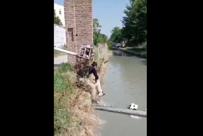 Video: KP police constable rescues stray dog from drowning in waterway