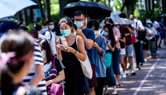 High turnout for Hong Kong's unofficial poll despite govt warning