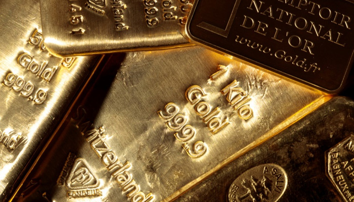 Gold soars to record high as investors rush into safe-haven commodity