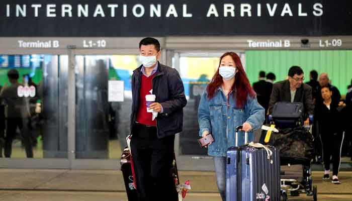 Coronavirus quarantine: Singapore to make travellers wear monitoring device 