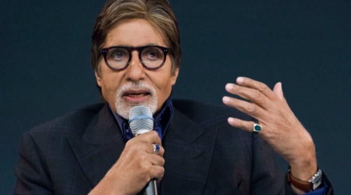 Amitabh Bachchan slams troll attacking him for not donating