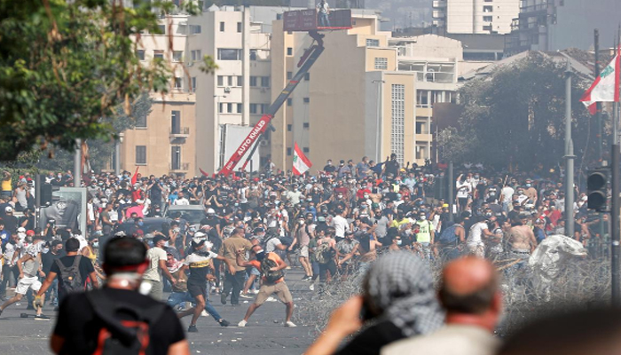 Shots, tear gas and flames as anti-govt protests after Beirut explosion grow