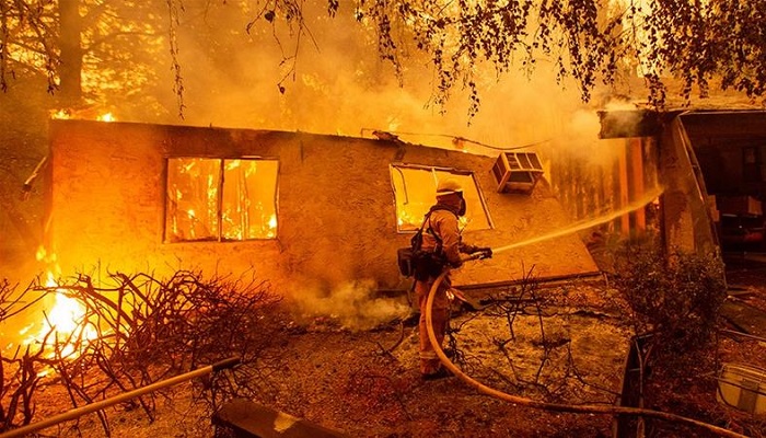 Out-of-control California wildfires displaces thousands 